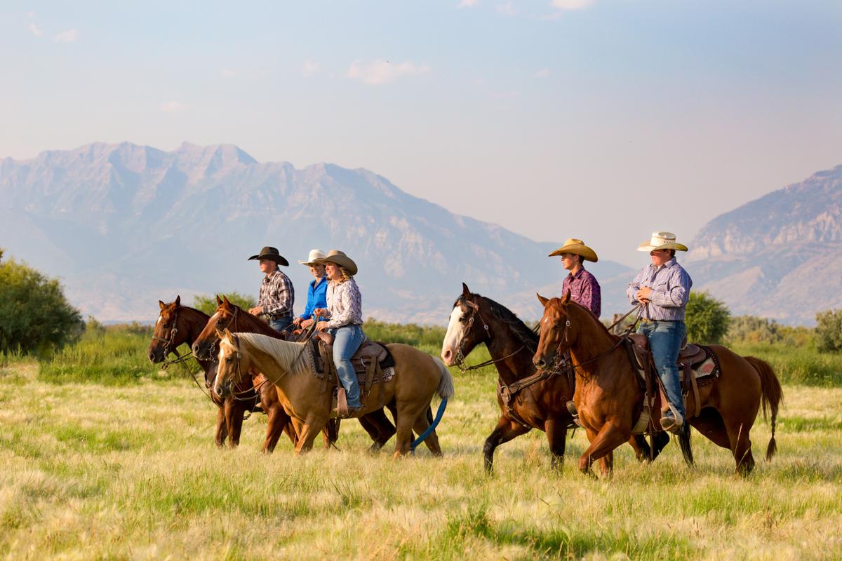 A group of tourists on horseback in the USA