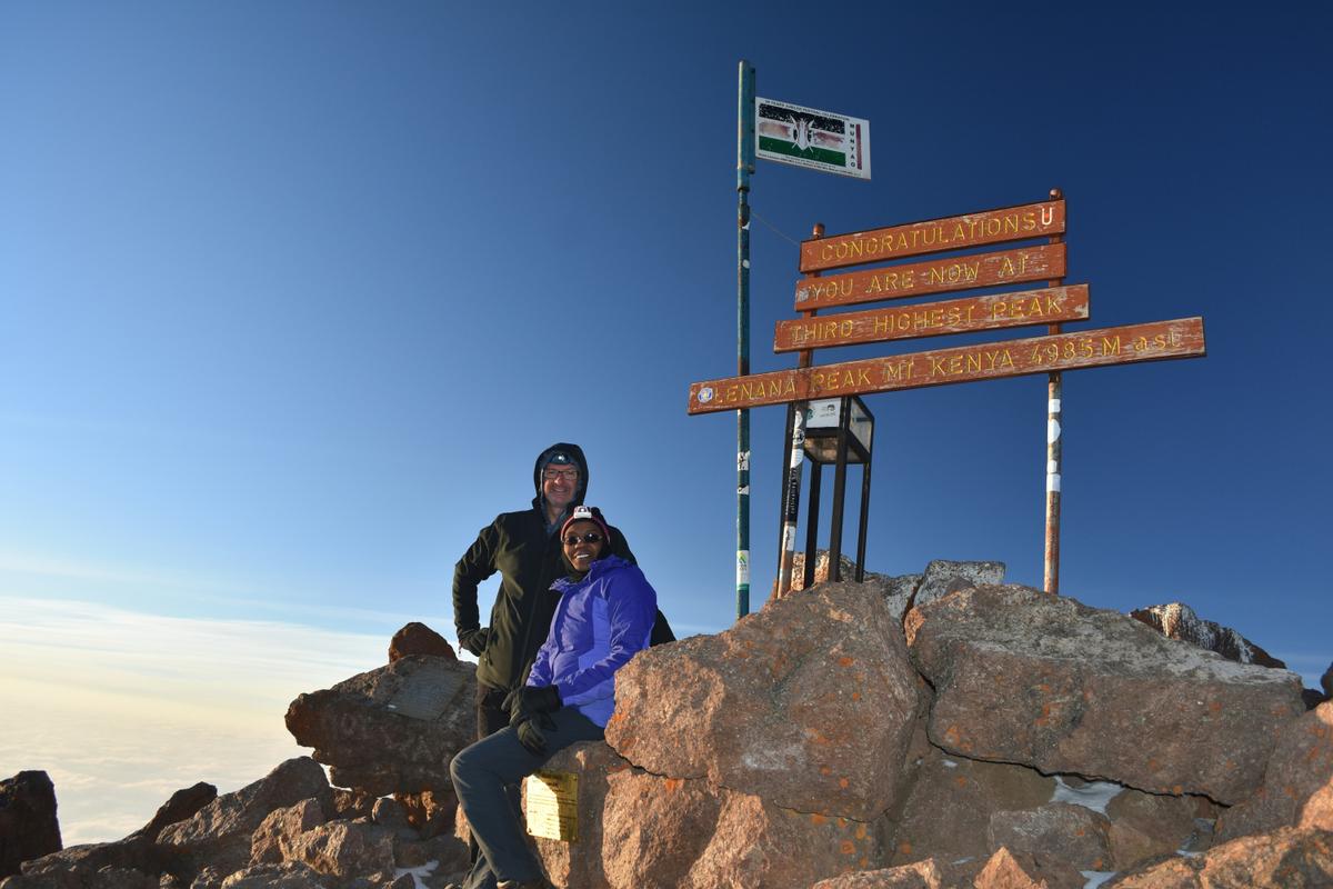 A couple of tourists at the top of Mount Kenya