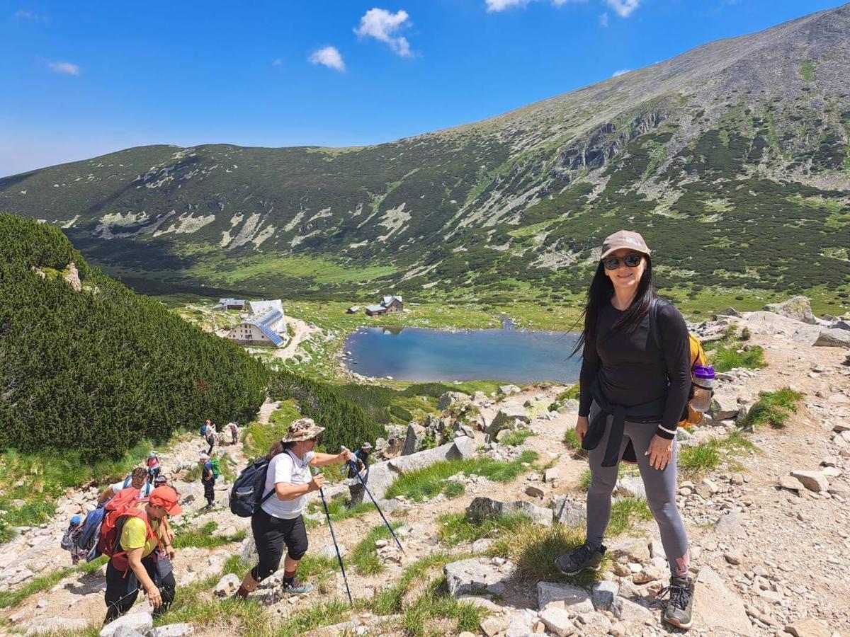 Woman on the Background of a Mountain Lake in Bulgaria