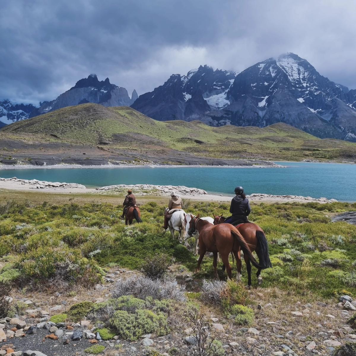 A group of tourists on horseback in Patagonia