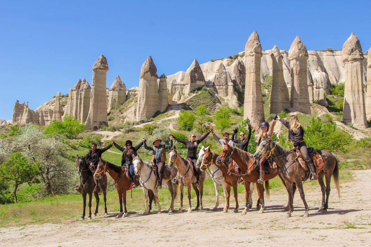 Group of Tourists on Horseback in Turkey