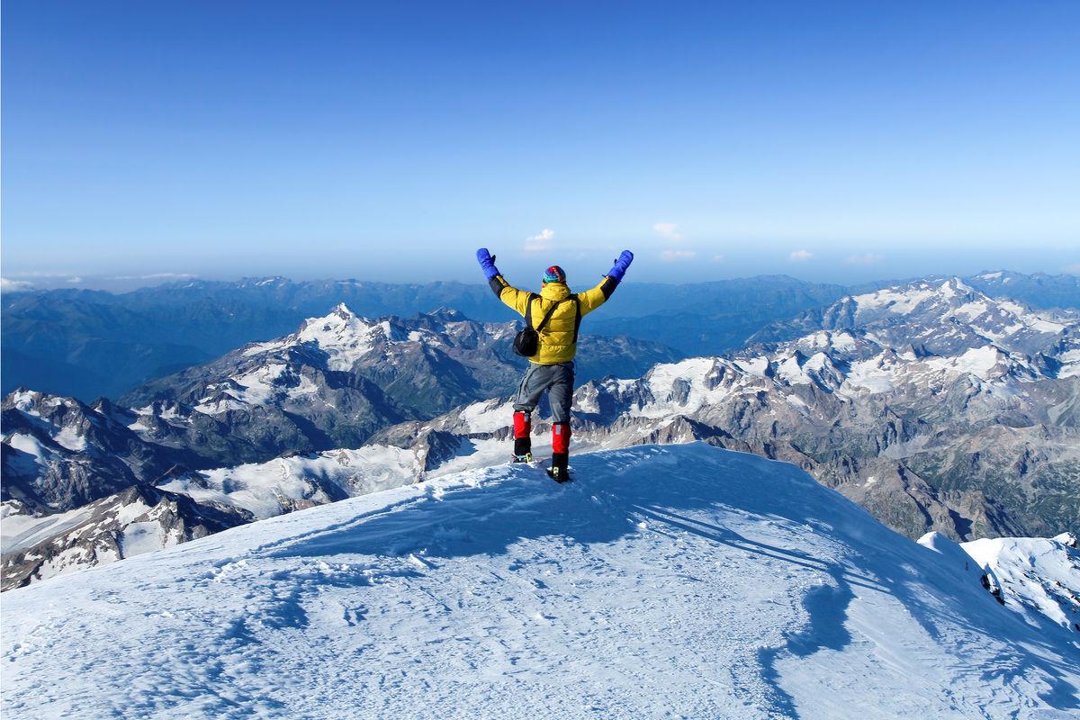 Mountaineer at the top of Mount Elbrus