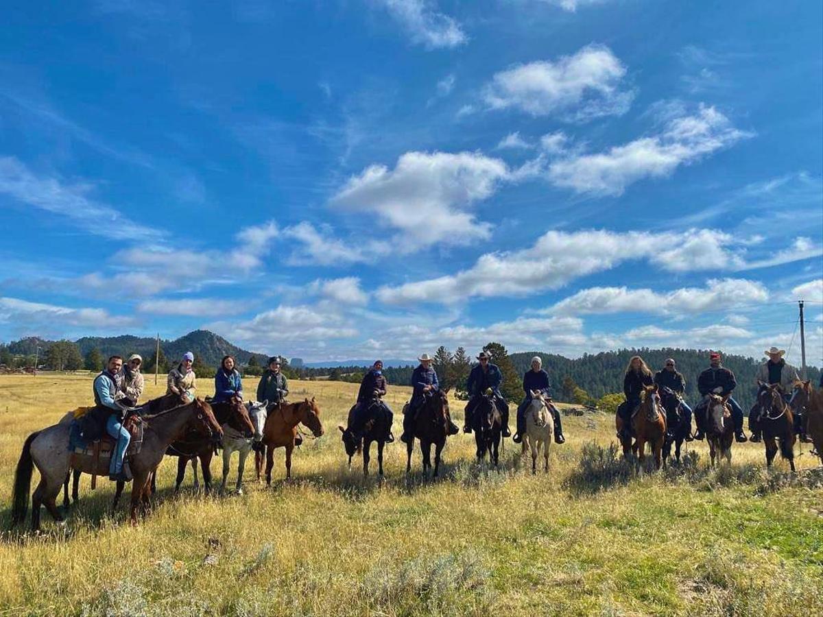 A group of tourists on horseback