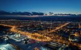 город